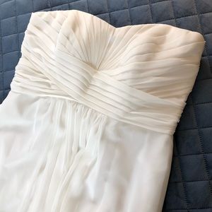 Size 10 strapless sweetheart neck wedding dress.